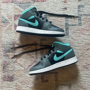 These are black grey and aqua blue air Jordan’s, barely have been worn